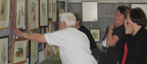 helpfulAssistants Leslie Walker and Norma Sarkin working, while Janice Sharp and Deb Shaw offer helpful advice.