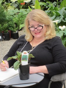 Alyse Ochniak demonstrating in the garden, photo by Deb Shaw.