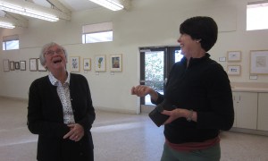 Consider volunteering to help with the "Artist's Favorite" SDBG exhibition—we have a good time. Photo of BAGSC members Joan Keesey (left) and Janice Sharp (right) enjoying a laugh during the hanging of the 2013 BAGSC exhibition at the SDBG.