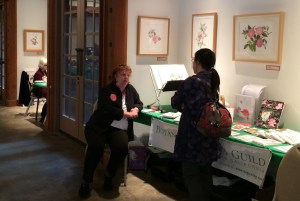 Artist Tania Norris chatting with Camellia enthusiast Hiromi Sato.