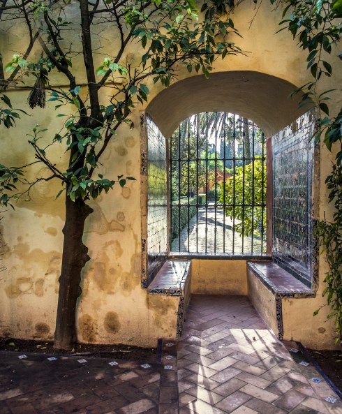 The tiled garden view in Alcazar Palace Gardens, © Quench Travel.