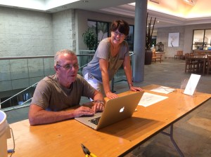 Janice Sharp and Andrew Mitchell review the plans for the exhibition layout. Photo by Beth Stone, © 2017.